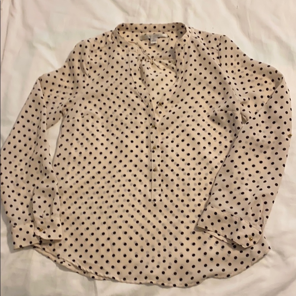 Cream and black shirt